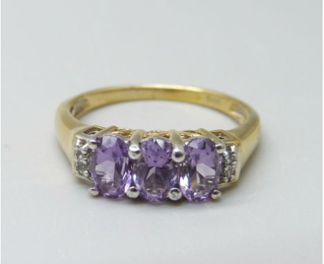 A silver gilt, amethyst and zircon ring, O 