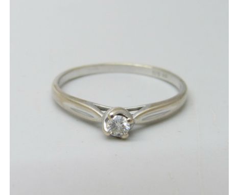 A 9ct gold and diamond solitaire ring, 1.6g, R 