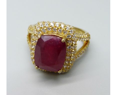 A silver gilt, ruby and zircon ring, T 