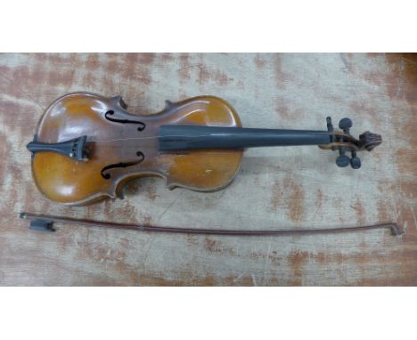 A violin with bow, cased, length of back excluding button 35.5cm, parts missing 