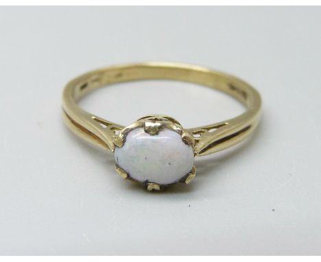 A 14k gold and opal solitaire ring, 1.9g, O 