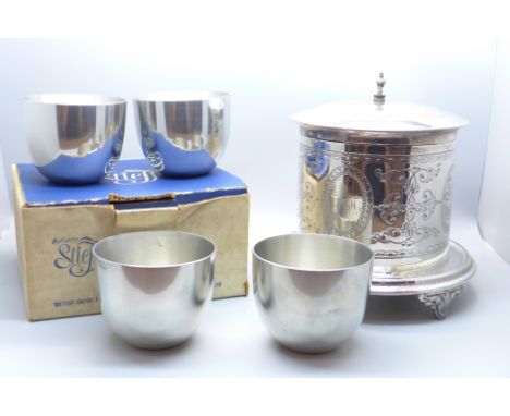 Four The Kirk Stieff Co., Baltimore 'The Jefferson Cup' pewter cups, two boxed and a silver plated tea caddy, hinge repaired 