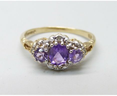 A 9ct gold, amethyst and diamond ring, 2g, M 