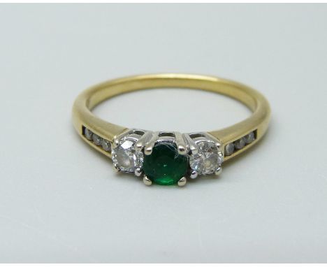 An 18ct gold, emerald and diamond ring, 3.1g, N 
