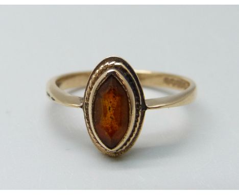 A 9ct gold and marquise citrine ring, 2g, K 