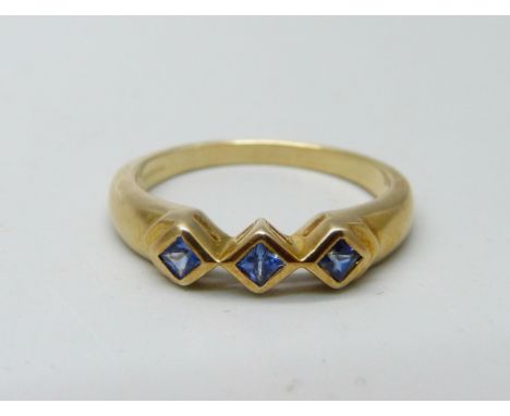 A 9ct gold and blue stone ring, 2.7g, N 