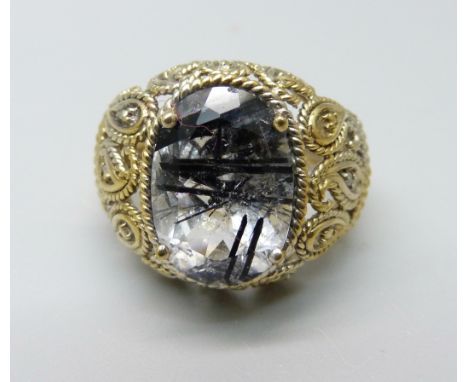 A silver gilt rutile quartz and four diamond accent ring, O/P 