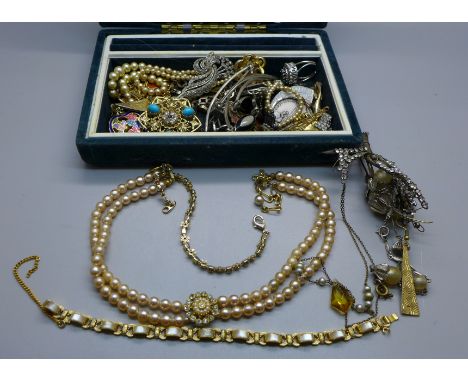 A box of vintage costume jewellery 