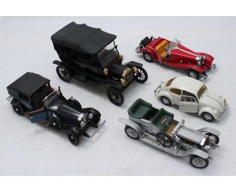 Five various scale model cars including a Franklin Mint Rolls-Royce Silver Ghost and a Rolls-Royce Phantom I etc. and some as