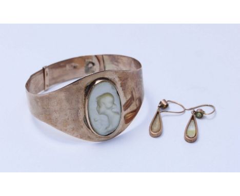 A 9ct gold and mother-of-pearl adjustable bangle and a pair of 9ct gold and mother-of-pearl drop earrings. Gross weight of lo
