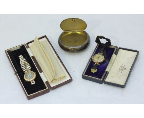 Two various 9ct gold wristwatches, together with a silver circular lidded snuff box.