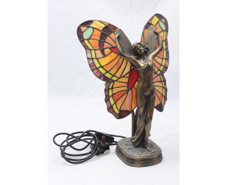 An Art Deco style figural lamp by Widdop Bingham and co. modelled as a winged lady. 40cm high.
