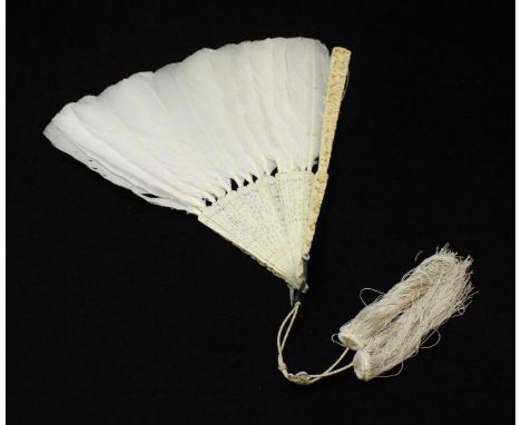 An ivory and white feather fan, with tassels and pierced and carved design of figures, foliage and flowers