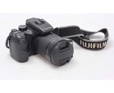 A Fujifilm 'Finepix S100fs' digital camera, with 28-400mm Super Macro lens and together with battery charger, user manual, fl
