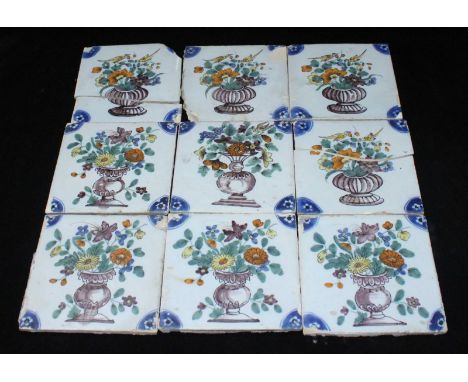 A set of nine 18th century English delft tiles, possibly Fazackerly, Liverpool, each decorated in polychrome enamels with flo