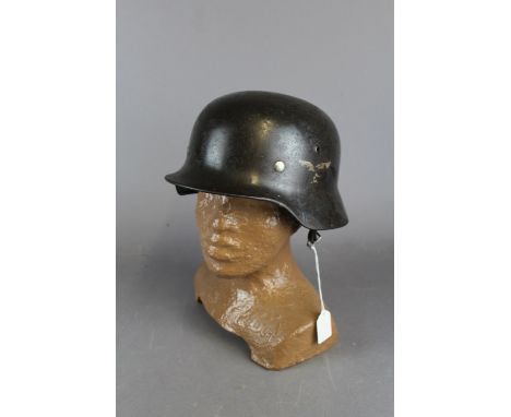 WW2 German M35 Helmet bearing Luftwaffe decals with leather interior but lacking strap.