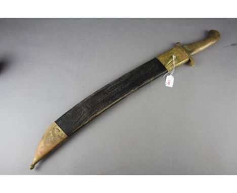 1827 Russian Pioneer sword with heavy brass handle and sawback blade. Held within brass mounted scabbard.