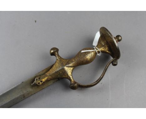 A Tulwar with british made leather covered scabbard. The Tulwar having gilt decoration to pommel and handle also with 85cm st