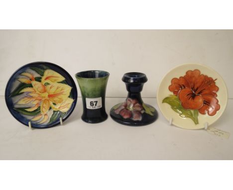 Two small Moorcroft dishes, candlestick, and a small blue and green vase