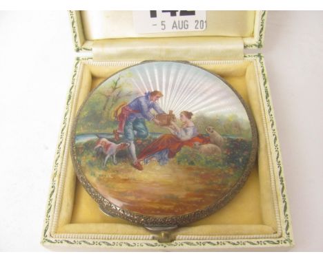A fine early 20th century German engine turned and enamelled silver powder compact, the front depicting a gentleman and a she