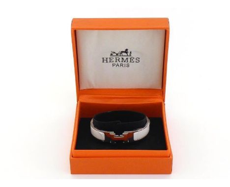Hermes, 'H' bangle, the palladium finish bangle with white enamel insert, 5.5cm inner diameter, in its box CONDITION: as new.