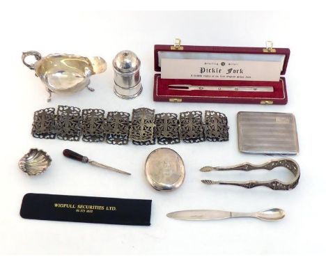 A group of silver comprising:-a silver pickle fork by Francis Howard Ltd., 1973, being a copy of the "Manners" table fork of 