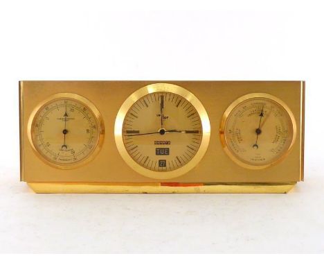 A Swiss desk weather station in gold anodised brush finish alloy by Imhof., comprising thermometer, barometer and quartz cloc