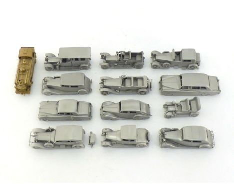 Twelve cast pewter models of Rolls Royce cars, all by Danbury Mint, and one gilt metal scale model of an 0-6-0 tank engine by