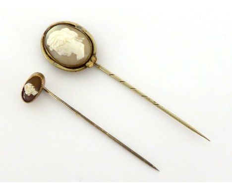 Two Victorian shell cameo stick pins, both mounted in yellow metal , with base metal pins CONDITION: solder repairs to the la