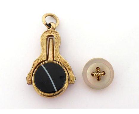 A 19th century sardonyx-set swivel fob and watch key, the frame foliate engraved (tests 15 carat gold), 3.2cm long, 4,2gms, t