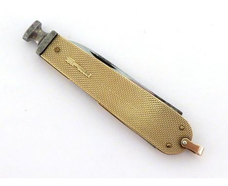 A 9-carat gold engine-turned smoker's compendium by S. J. Rose & Son, Birmingham, 1963, with steel blade and cigar piercer, w