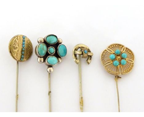 A group of turquoise set stick pins, mounted in gilt or white metal, various designs (4)CONDITION: one with deterioration to 