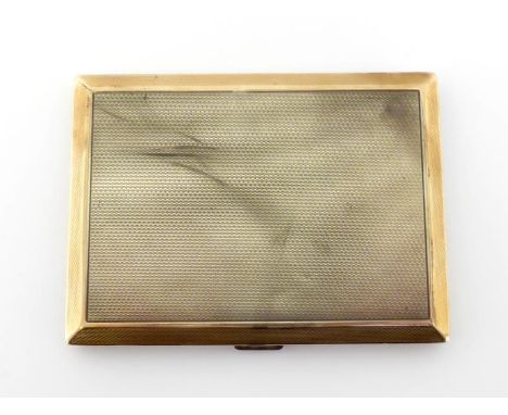 A silver engine-turned cigarette case with gold-plated border, Birmingham, 1930,  inscribed to gilt interior, 11.5 cm. long, 