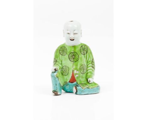 A laughing boyChinese porcelain sculpturePolychrome decoration19th / 20th century(minor losses to enamel)Height: 17 cm 