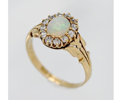 An 18ct opal and diamond cluster ring, size P.