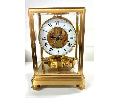 A fine gilt brass Jaeger-LeCoultre Atmos clock with original box, Model 540,The Perpetual Motion clock. Height 24cm. The cloc