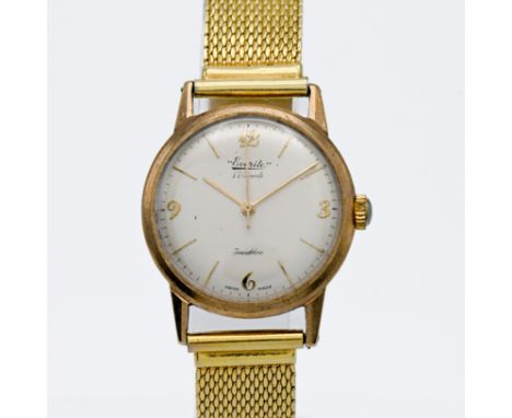 A 9ct yellow gold Everite manual wind wristwatch, seventeen jewels, Incabloc. Gold plated bracelet.