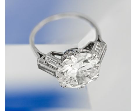 An impressive large diamond ring, set with one old brilliant cut diamond with an approximate carat weight of 5.50 carats. Als