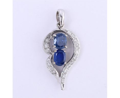 18 kt white gold pendant set with sapphire and diamond. Of which 2 oval cut sapphires of approx. 0.23ct. and 14 brilliant cut
