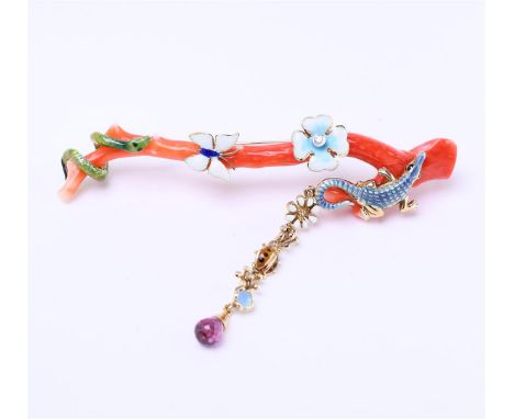 14kt yellow gold brooch/pendant combination with red coral and enamel. This piece of jewelry can be worn as a brooch but also