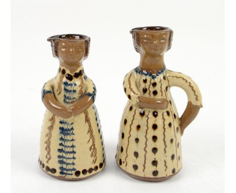 REVISED ESTIMATE Rosemary Wren (1922-2013) for Oxshott Pottery pair of oil and vinegar bottles modelled as girls with sgraffi