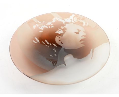 Luana Adriani (fl.1975-2007), portrait glass dish sandblasted with the image of a female head and shoulders on burnt amber gl