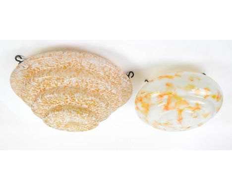 Art deco glass ceiling light shades, one in stepped form mottled glass in orange and white with cut linear zig-zag decoration