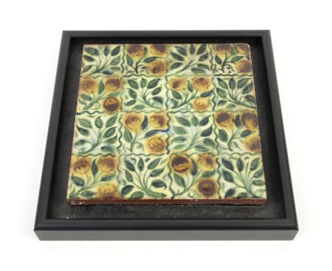 William De Morgan tile in berries and leaves repeating pattern, mounted within a wooden frame, 15cmCondition Report:  Overall