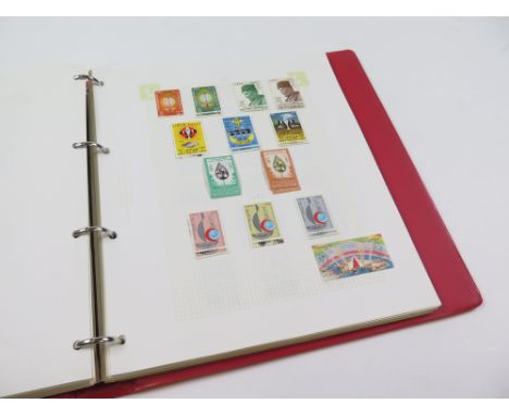 World collection in red binder countries 'K' and 'L' inc Korea, Kuwait, Liberia and Libya, mint & used (qty)