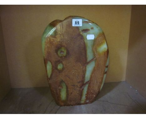 A large rough Jade boulder, 32.5cm high