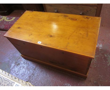 A pine trunk with triple lock 93cm wide 