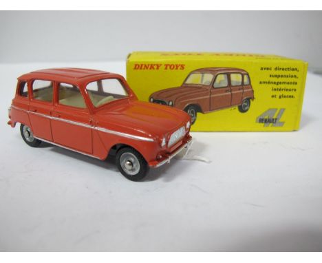 A Boxed Original French Dinky #518 Renault 4L, brick red body, silver detailing, cream interior, convex hubs. Model very good