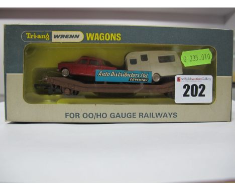 A Tri-ang Wrenn 'OO' Scale Wagon, W4652P - low mac with car and caravan. Boxed