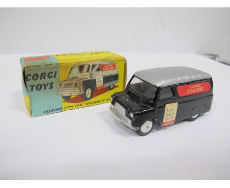 A Boxed Original Corgi #421, Bedford 12 CWT van 'Evening Standard'. Black boy, silver ridged roof, smooth hubs, un-divided wi